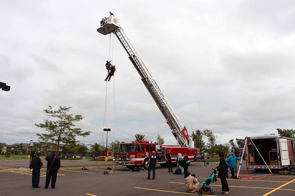 Somers Firefighters demonstrate aerial ladder rescue techniques during the 2019 safety fair. Source: Village of Somers.
